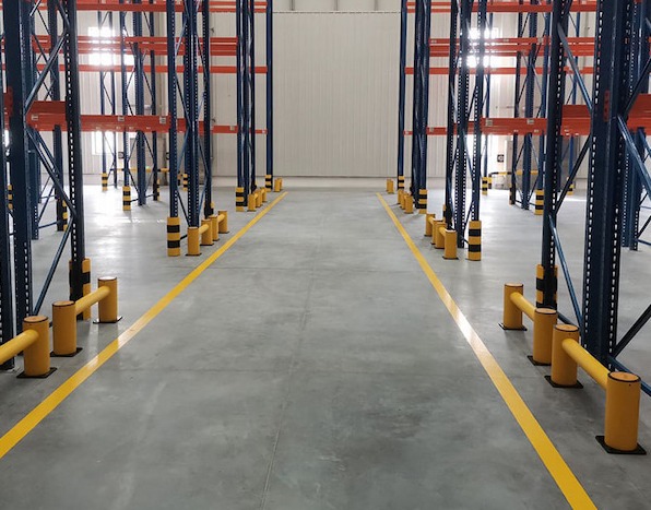 Polymer guardrail system for rack-end safety